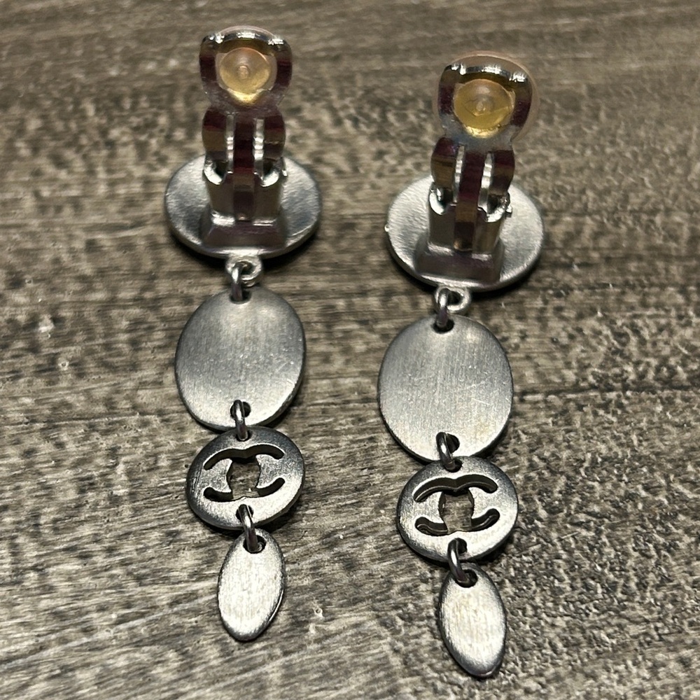 229. CHANEL (Clip)Oval Drop Matte Silver Logo Earrings w/coa - Picture 5 of 8